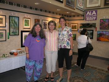 AiA artists, Melody Fahey, Nathelle and Cynthia Herron (Chairman of "Paint The Town" event)